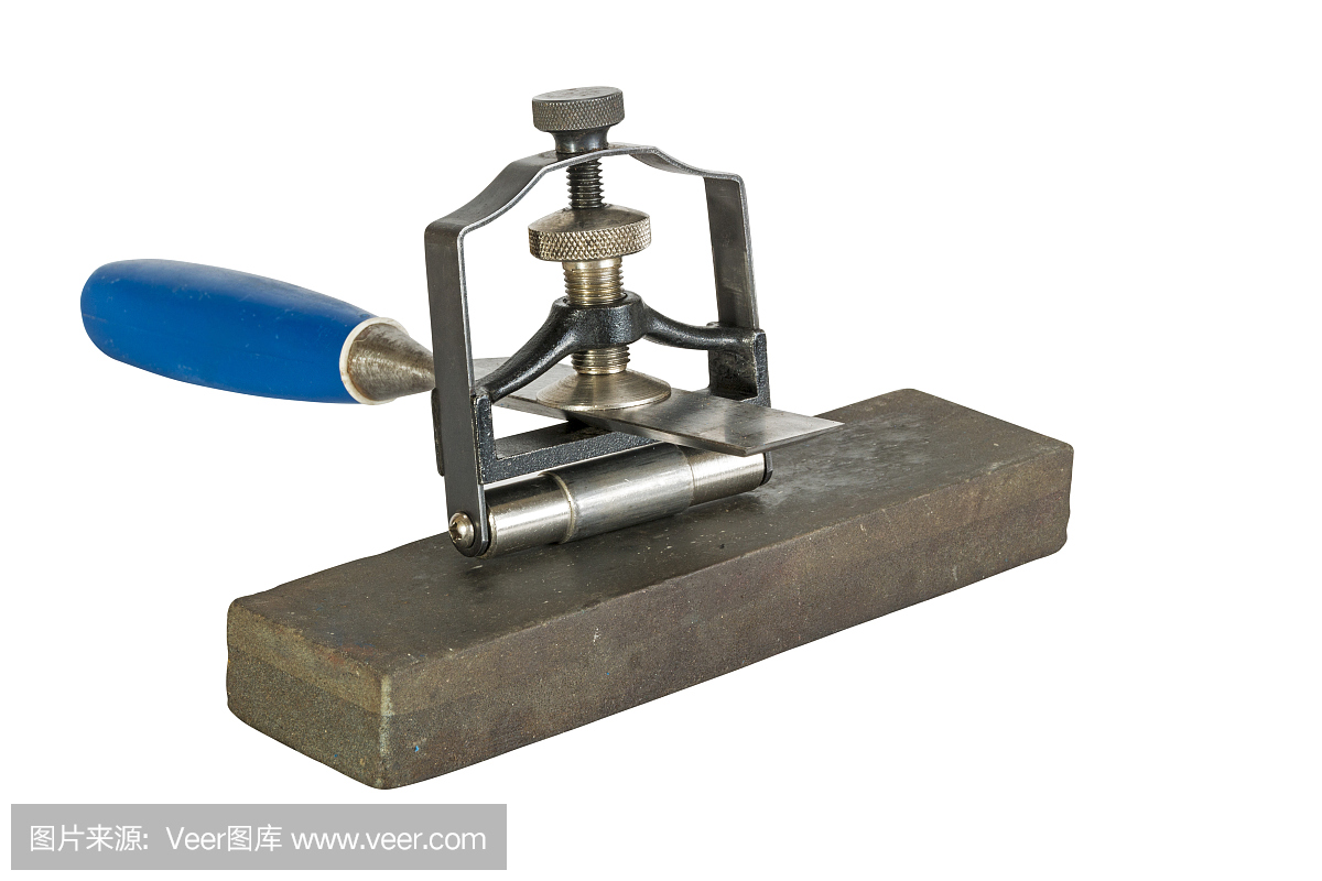 在磨石磨具上夾角導(dǎo)向夾具的鑿子